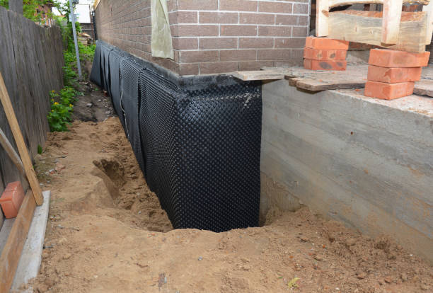 Happy homeowners after waterproofing job in Brownsburg
